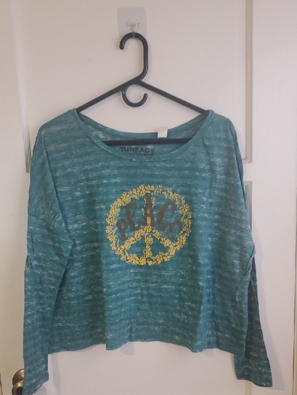 Threads 4 Thought Teal Cropped Long-Sleeve Top with Yellow Floral Peace Emblem
